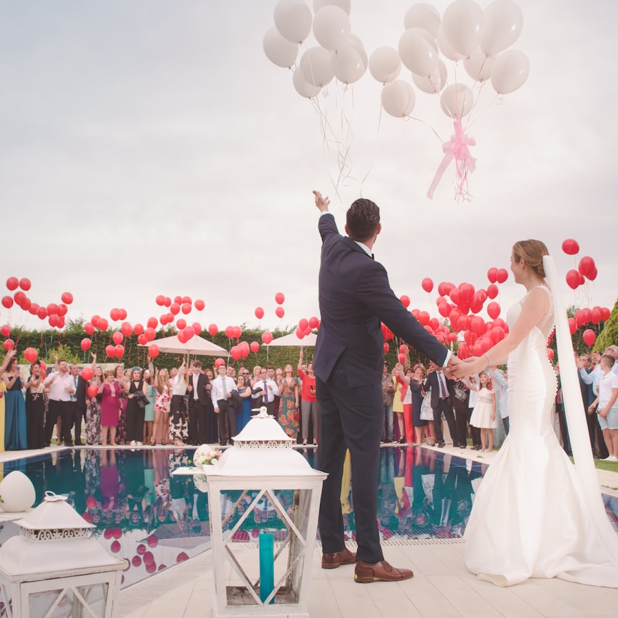 Wedding reception celebration with balloons by the pool
